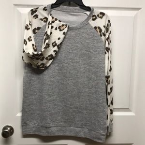 Beautiful gray shirt with leopard sleeves